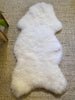 extra white sheepskin pelt