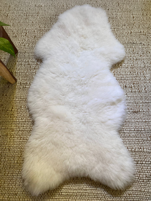 extra white sheepskin pelt
